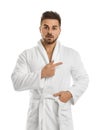 Handsome man wearing bathrobe on white background Royalty Free Stock Photo