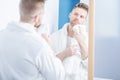 Handsome man wearing dressing gown Royalty Free Stock Photo