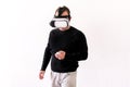 Handsome man wearing and playing virtual reality on isolated white background. Boy action in virtual reality helmet. VR glasses. Royalty Free Stock Photo