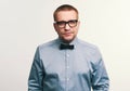 Handsome man wearing spectacles and bow tie Royalty Free Stock Photo