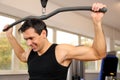 Handsome man working out in a gym