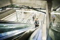 Businessman on an escalator on a metro station. Royalty Free Stock Photo