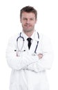 Handsome mature doctor is looking at camera while standing with folded arms Royalty Free Stock Photo