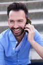 Handsome mature guy talking on mobile phone Royalty Free Stock Photo