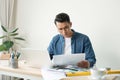 Handsome mature male architect working at office desk Royalty Free Stock Photo