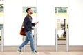 Handsome mature man walking on the city street Royalty Free Stock Photo