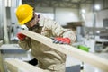 Handsome mature man working in furniture factory Royalty Free Stock Photo