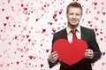 Handsome men hold big red heart Royalty Free Stock Photo