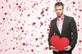 Handsome men hold big red heart Royalty Free Stock Photo