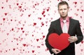 Handsome men hold big red heart Royalty Free Stock Photo