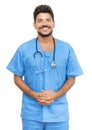 Handsome mexican male nurse at work