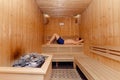 handsome middle aged man lying in finland sauna. relaxation and rest concept Royalty Free Stock Photo