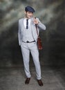 Handsome middle aged man posing in studio on isolated background. Style, elegance, business, gentleman, fashion concept. Royalty Free Stock Photo