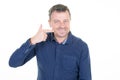 Handsome middle aged man is waving his hand towards him happy and smiling Royalty Free Stock Photo