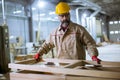 Handsome middle aged worker working in the furniture factory Royalty Free Stock Photo