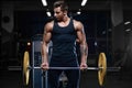 Handsome model young man workout in gym Royalty Free Stock Photo