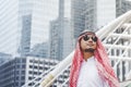 Handsome modern Arabian man standing in modern city wear muslim dress headscarf eastern ethnic smile outside office. Arab Man