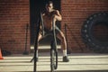 Young african man working out with battle ropes at a gym Royalty Free Stock Photo