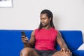 Handsome black man using cell phone Royalty Free Stock Photo