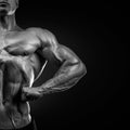 Handsome muscular bodybuilder posing on Front Lat Spread Royalty Free Stock Photo