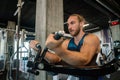 Handsome muscular man working out hard at gym Royalty Free Stock Photo