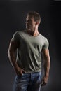 Handsome muscular fit young man looking to a side Royalty Free Stock Photo