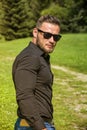 Handsome Muscular Hunk Man Outdoor in City Park Royalty Free Stock Photo