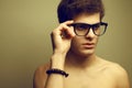 Handsome muscular male model in glasses Royalty Free Stock Photo