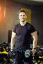 Handsome muscular man working out hard at gym Royalty Free Stock Photo