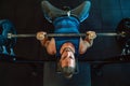 Handsome muscular man working out hard at gym Royalty Free Stock Photo