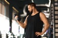 Handsome Muscular Young Man Training With Dumbbells In Modern Gym Royalty Free Stock Photo