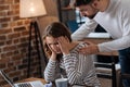 Handsome nice man comforting his girlfriend Royalty Free Stock Photo