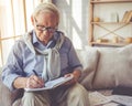 Handsome old man at home Royalty Free Stock Photo