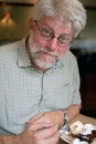 Man eating a decedent dessert