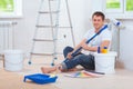 A handsome painter sitting on floor Royalty Free Stock Photo