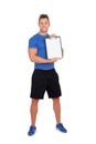 Handsome personal trainer with clipboard