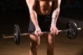 Handsome power athletic man with barbell. Strong bodybuilder with six pack, perfect abs, shoulders, biceps, triceps and Royalty Free Stock Photo