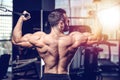 Handsome power athletic man diet training pumping up back muscle Royalty Free Stock Photo