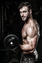 Handsome power athletic man on diet training pumping up muscles Royalty Free Stock Photo