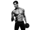 Handsome power athletic man in training pumping up muscles with Royalty Free Stock Photo