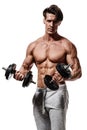 Handsome power athletic man in training pumping up muscles with Royalty Free Stock Photo