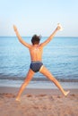 Handsome preteen boy with anti sunburn cream sun drawing on his Royalty Free Stock Photo