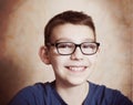 Handsome preteen boy with correction myopia glasses Royalty Free Stock Photo
