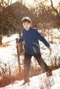 Handsome preteen boy on the country winter