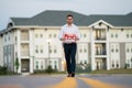 Handsome real estate agent holding banner house for sale. House with land and insurance. Business man real estate agent Royalty Free Stock Photo