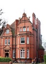 Handsome red brick building with elaborate details. Royalty Free Stock Photo