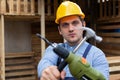 Handsome repairman holding tools Royalty Free Stock Photo