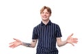 handsome 25s blond male with tattoos with open arms Royalty Free Stock Photo