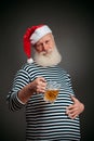 Handsome sailor. Seaman. Santa claus with beer Royalty Free Stock Photo