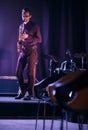 Handsome saxophone player performing on a stage Royalty Free Stock Photo